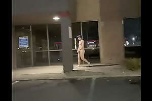 Naked walk in front of strip mall