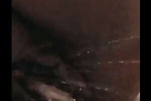 Ebony peeing up close