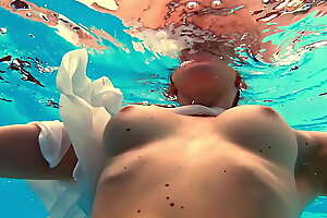 Big tits Anastasia Ocean swimming naked underwater