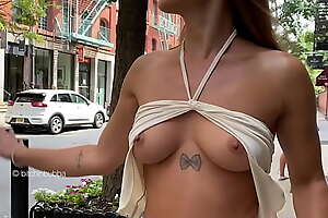 boobs out on the sidewalk
