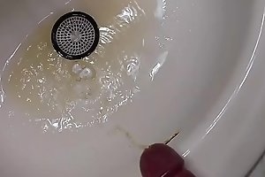 Pissing in the bathroom sink