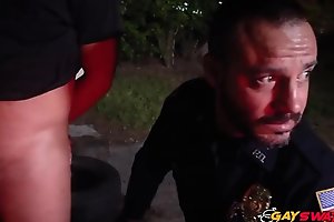 Car thief is subdued into making his cock hard and drill gay cops