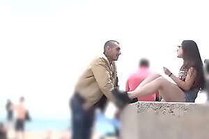 He proves he can pick any girl at the Barcelona beach