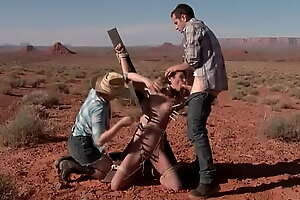 Deviant couple torment babe in desert